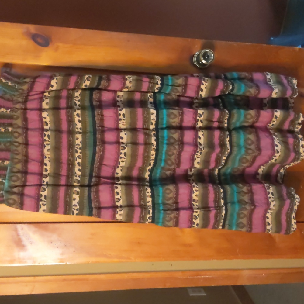 100% cotton, lined long full skirt w/elasticized waist size "L"